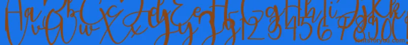 featrisse-Schriftart – Braune Schriften auf blauem Hintergrund