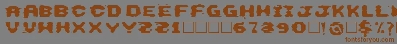 CheThisフォントについての詳細 フォントCheThis – 茶色の文字が灰色の背景にあります。