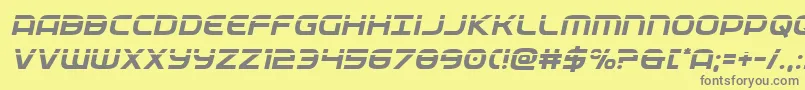 フォントfederalservicelaserital – 黄色の背景に灰色の文字