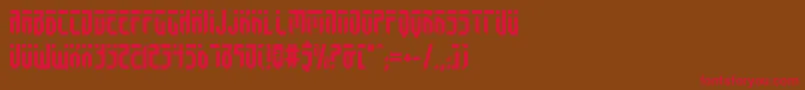 フォントfedyral – 赤い文字が茶色の背景にあります。