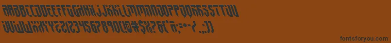 フォントfedyral2left – 黒い文字が茶色の背景にあります