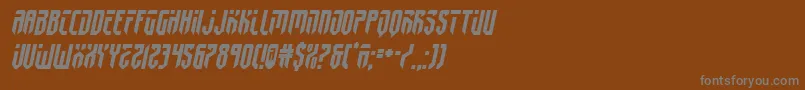 fedyral2semital-fontti – harmaat kirjasimet ruskealla taustalla