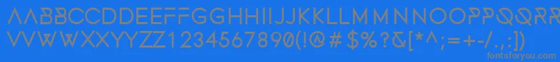 フォントFonecianBold – 青い背景に灰色の文字