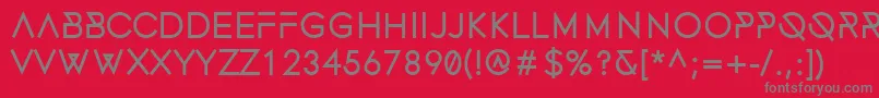 フォントFonecianBold – 赤い背景に灰色の文字