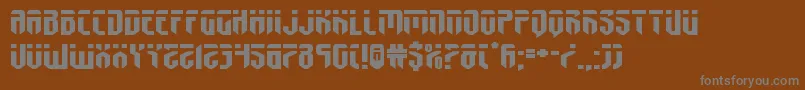 fedyralxtraexpand-Schriftart – Graue Schriften auf braunem Hintergrund