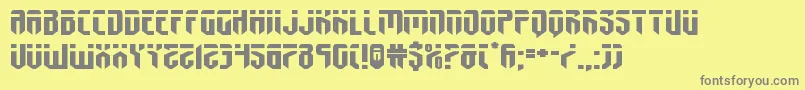 フォントfedyralxtraexpand – 黄色の背景に灰色の文字