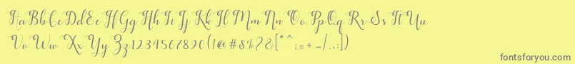 フォントfeeling – 黄色の背景に灰色の文字