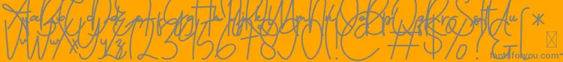 FeliciaSignature Script-Schriftart – Graue Schriften auf orangefarbenem Hintergrund