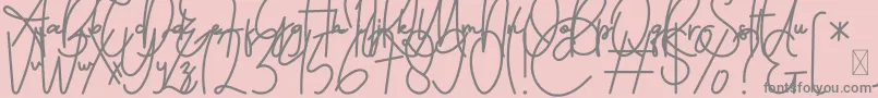 FeliciaSignature Script-fontti – harmaat kirjasimet vaaleanpunaisella taustalla