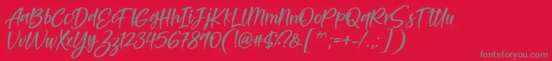 Feltarigo Font by 7NTypes Font – Gray Fonts on Red Background