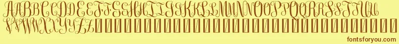 FreemonogramBeta0.5 Font – Brown Fonts on Yellow Background