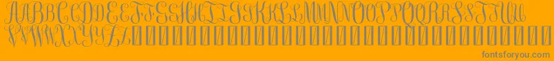 FreemonogramBeta0.5-Schriftart – Graue Schriften auf orangefarbenem Hintergrund