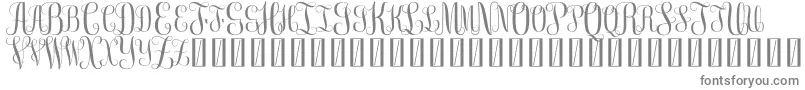 FreemonogramBeta0.5-fontti – harmaat kirjasimet valkoisella taustalla