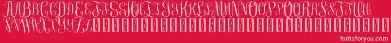 FreemonogramBeta0.5-Schriftart – Rosa Schriften auf rotem Hintergrund