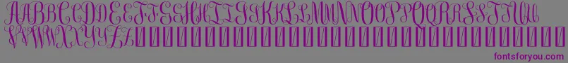 FreemonogramBeta0.5-Schriftart – Violette Schriften auf grauem Hintergrund