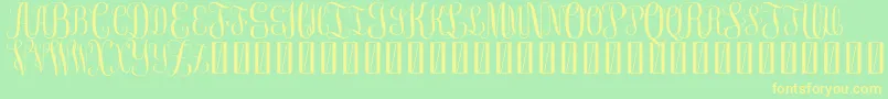 FreemonogramBeta0.5-Schriftart – Gelbe Schriften auf grünem Hintergrund