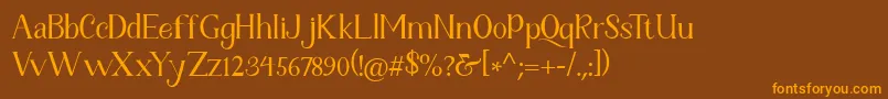 Fetance Reguler Font – Orange Fonts on Brown Background