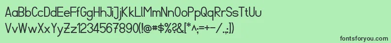 フォントFibel Sued – 緑の背景に黒い文字