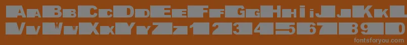 fifth avenue-fontti – harmaat kirjasimet ruskealla taustalla