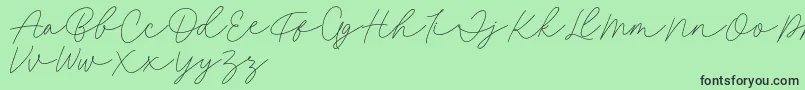 Fonte Fillia Script FREE – fontes pretas em um fundo verde