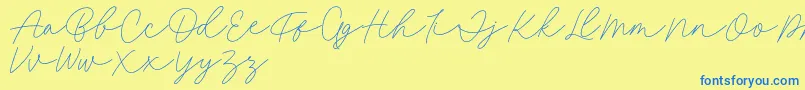 Fillia Script FREE-Schriftart – Blaue Schriften auf gelbem Hintergrund
