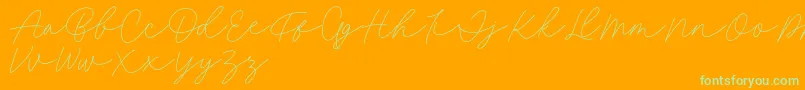 フォントFillia Script FREE – オレンジの背景に緑のフォント