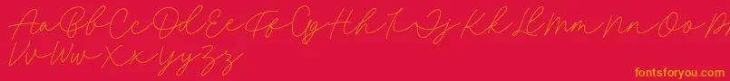 Fillia Script FREE-fontti – oranssit fontit punaisella taustalla