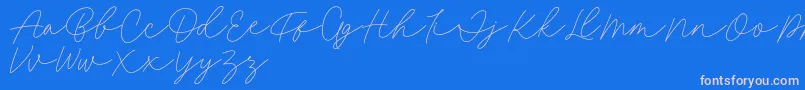 Fillia Script FREE-Schriftart – Rosa Schriften auf blauem Hintergrund