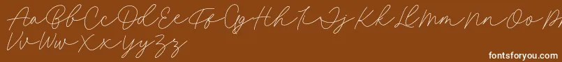 Шрифт Fillia Script FREE – белые шрифты на коричневом фоне