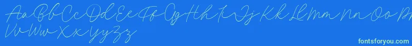 Fillia Script FREE-Schriftart – Grüne Schriften auf blauem Hintergrund