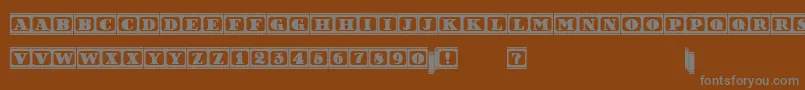 FilmLetters Font – Gray Fonts on Brown Background