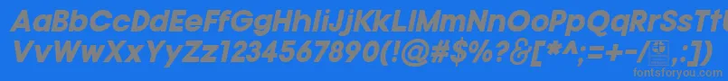 Czcionka TypoGotikaBlackItalicDemo – szare czcionki na niebieskim tle