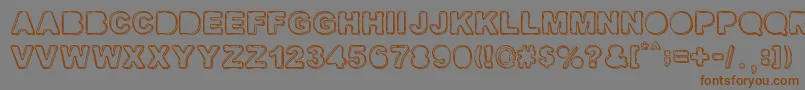 フォントFINE SHADOWS – 茶色の文字が灰色の背景にあります。
