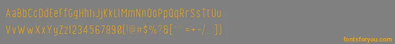 フォントFinland Rounded Thin – オレンジの文字は灰色の背景にあります。