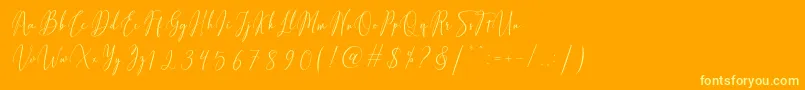 Fiolenitta Font – Yellow Fonts on Orange Background