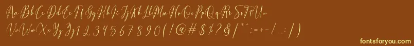 Fiolenitta-Schriftart – Gelbe Schriften auf braunem Hintergrund