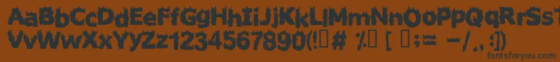 FIRESTARTER Font – Black Fonts on Brown Background