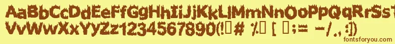 フォントFIRESTARTER – 茶色の文字が黄色の背景にあります。