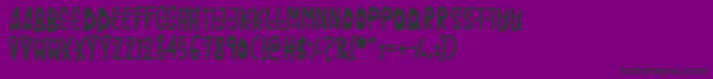 フォントFireworks Kid – 紫の背景に黒い文字