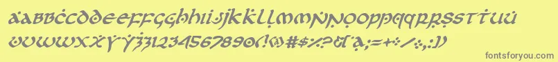 フォントfirstorderital – 黄色の背景に灰色の文字