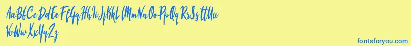 Firyana Beauty-Schriftart – Blaue Schriften auf gelbem Hintergrund