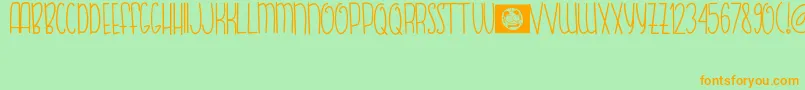 FISH  BEAR Font – Orange Fonts on Green Background