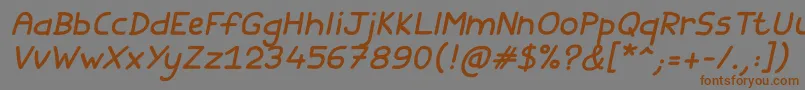 フォントFishes Friends Italic – 茶色の文字が灰色の背景にあります。