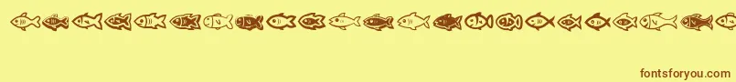 フォントFishes – 茶色の文字が黄色の背景にあります。