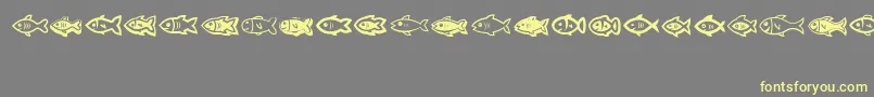 Fishes Font – Yellow Fonts on Gray Background