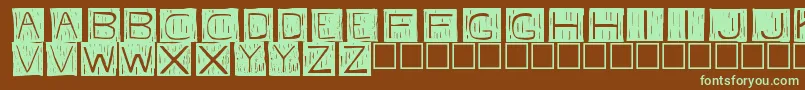 fkafont -Schriftart – Grüne Schriften auf braunem Hintergrund