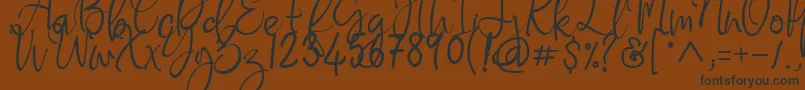 Flaming Carrot Font – Black Fonts on Brown Background