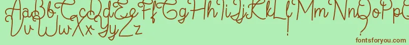 フォントFlamingo Regular – 緑の背景に茶色のフォント