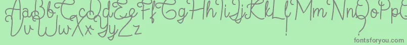 フォントFlamingo Regular – 緑の背景に灰色の文字