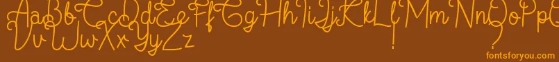 フォントFlamingo Regular – オレンジ色の文字が茶色の背景にあります。